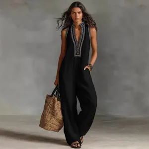 Women's black sleeveless linen blend jumpsuit featuring stand collar and elegant embroidery.