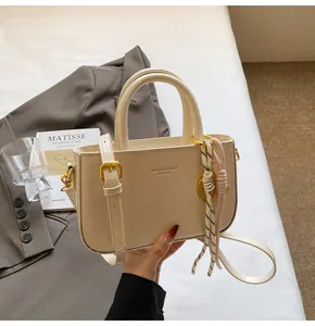 Chique retro kleine handtas voor dames, met dubbele handvatten en een verstelbare schouderriem.
