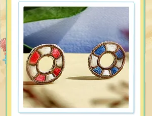 Exquisite detail view of handmade seaside lifebuoy embroidery patch for DIY decoration.