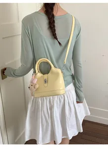 Elegante borsa a secchiello gialla da donna, trendy borsa a tracolla in pelle PU.