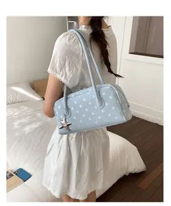 Sweet girls polka dot shoulder bag, trendy bowling handbag with star charm for daily use.