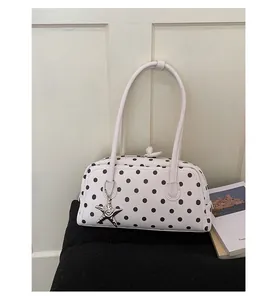 Sweet polka dot bowling bag for women, stylish underarm shoulder bag with metal star charm.