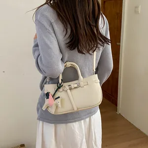 Korean retro litchi pattern women shoulder bag, chic spring 2026 new crossbody handbag style.