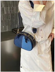 Schicke Jeans Patchwork Umhängetasche mit Schleife, ideal für den täglichen Weg zur Arbeit.