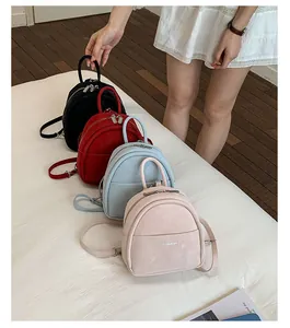 Minimalist small backpack for women, casual multi-color student daypack, stylish daily bag.