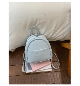 Lightweight minimalist mini backpack for women, casual stylish small daypack for daily use.