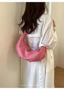 Minimalist pink crescent dumpling bag for women, stylish underarm shoulder style