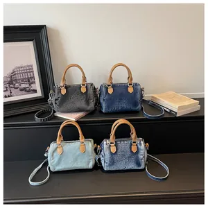 Vintage wash denim boston handbag for women, chic shoulder and crossbody bag with multi colors.