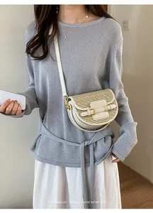 Modern cream white straw woven saddle crossbody bag for women's chic summer vacation styling