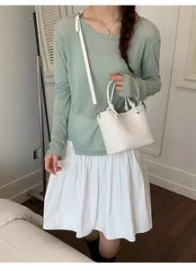 Retro woven crossbody bag for women, stylish niche design handbag with top handle.