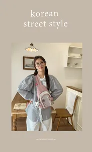 Stylish pink chest bag with clear window, casual sling backpack for daily use and street style.