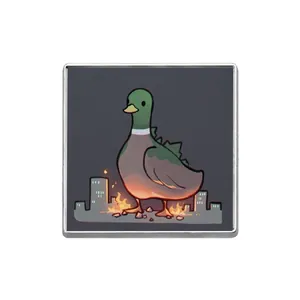 Badge en émail avec illustration créative de canard monstre drôle et cadre métallique