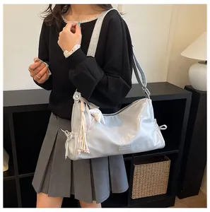 Retro trendy tote shoulder bag for women, large capacity commuting crossbody bag versatile daily use.