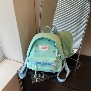 Zaino verde carino con stelle borsa casual alla moda per ragazze e scuola quotidiana