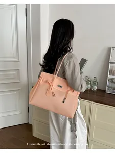 Large capacity jelly tote bag for women, stylish summer shoulder bag for daily casual commute.