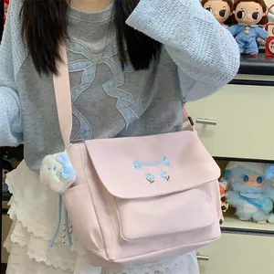 Pink large capacity canvas messenger bag for women, cute shoulder crossbody bag.