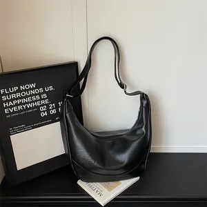 Black hobo shoulder bag minimal PU leather dumpling bag casual chic fashion handbag.