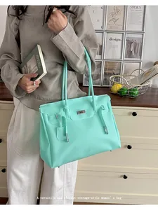 Mint green women's tote bag, large capacity shoulder bag for daily commute and stylish casual wear.