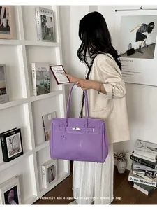 Elegant purple tote bag for women, large capacity shoulder bag for daily commute and stylish look.