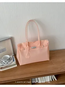 Discover this chic 2026 summer jelly tote bag, offering large capacity and casual style.