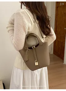 Chic women bucket handbag stylish crossbody bag versatile retro design for daily fashion wear.