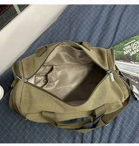 Large capacity green canvas travel duffel bag, waterproof gym handbag for short trips.