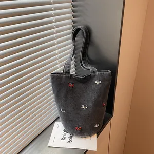 Borsa a secchiello in denim casual da donna, grande borsa a tracolla vintage con ricamo elegante.