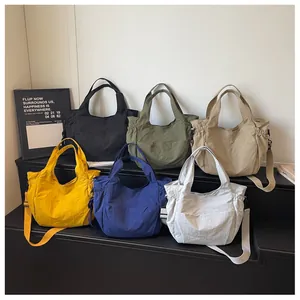 Minimalist nylon waterproof shoulder crossbody bag, large capacity casual tote bag.