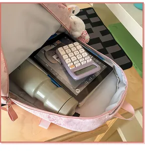 Detail view of the pink cute student backpack interior capacity, showing spacious storage.