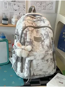 Close-up detail of fashionable grey and white marble tie-dye backpack for students