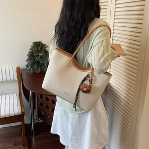 Stylish large capacity tote bag for women, summer casual shoulder bag with chic design.