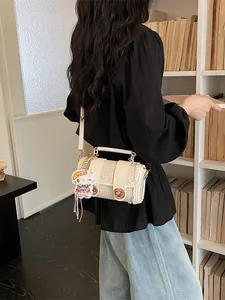 Stylish contrast plaid boston shoulder bag for women, commuter crossbody handbag with charm.