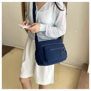 Women nylon crossbody bag multi-pocket casual shoulder bag for daily travel and use.