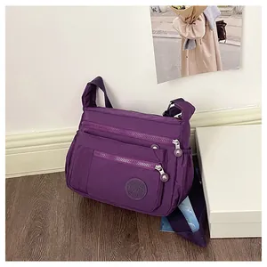 Purple nylon crossbody bag with multi zip pockets for women travel casual shoulder bag