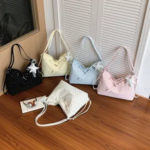 Casual polka dot shoulder bag, large capacity commuting tote bag for women daily fashion style.