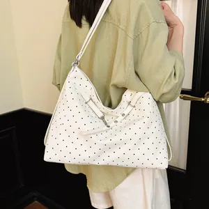 Polka dot shoulder bag with large capacity, slouchy hobo design, and chic daily casual style.