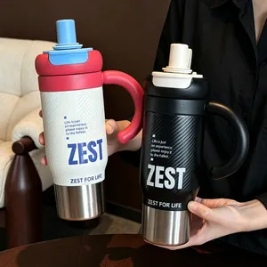 Stainless steel insulated tumbler with handle and straw lid, large capacity stylish travel bottle.