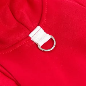 Red pet hoodie detail shot showing D-ring and strap for dogs and cats clothing.