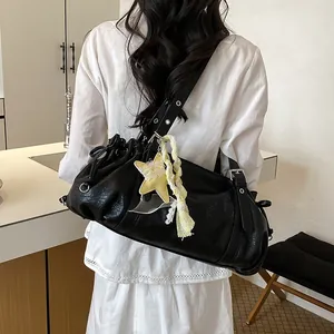 Black pleated shoulder bag for women, chic underarm tote bag with star charm for daily commute.