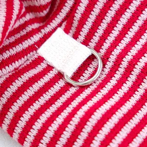 Red and white striped knitted pet hoodie detail with metal d-ring and fabric loop for small dogs.
