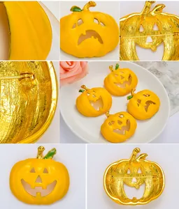 Halloween pumpkin enamel brooch detail view showing front and back craftsmanship and gold tone.
