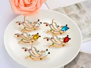 Exquisite rhinestone goldfish brooch detailed view, crystal animal pin for stylish outfits.