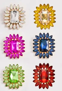 Crystal rhinestone flower brooch details showcasing multi-color sparkling gemstone variants.