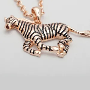 Rose gold tone zebra pendant necklace, cute animal jewelry accessory for women daily wear.