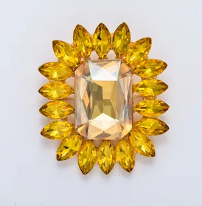 Exquisite crystal rhinestone flower brooch with yellow marquise stones for women fashion style.