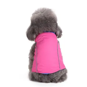 Back view of pink padded dog vest with reflective stripes for the winter season