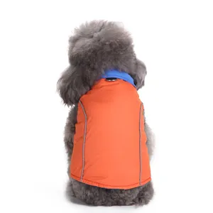 Detailed back view of orange and blue warm dog winter jacket with reflective strips