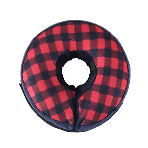 Red and black plaid pet recovery collar, soft inflatable dog cone for healing wounds after surgery.