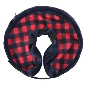 Inflatable pet recovery collar detail, soft red black plaid fabric, comfortable dog neck cone.