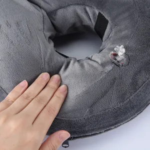 Close up view of soft grey plush inflatable pet recovery collar detail and inflation valve.